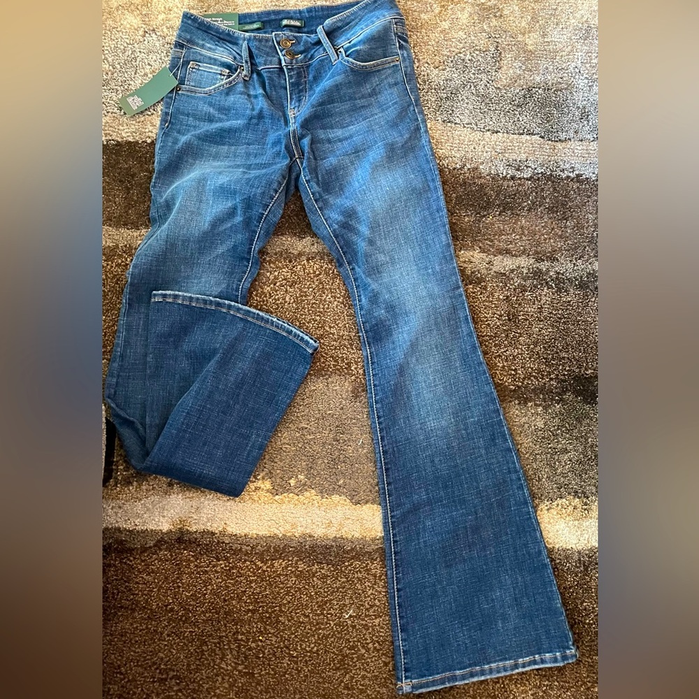 Low-Rise, FLARE, STRETCH denim jeans; women’s SIZE 10; Medium wash; “Wild Fable”